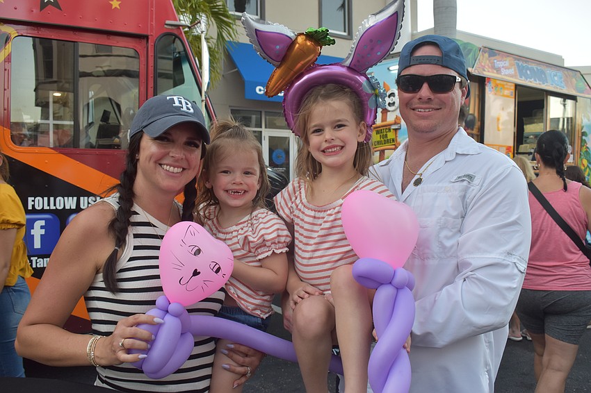 The Zimmerman family — Ashton, 2-year-old Teagan, 5-year-old Grace and Ryan — attend Music on Main every month because it is a fun event with something new every time.