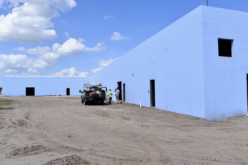 An aircraft hangar will be built behind the school.