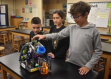 Team Thunderbolts members Kenny Van Slyck, Avery Szuma and Matteo Saviano won a Create Award, which rewards unique approaches to gameplay over the standard design, to qualify for The VEX Robotics World Championship.