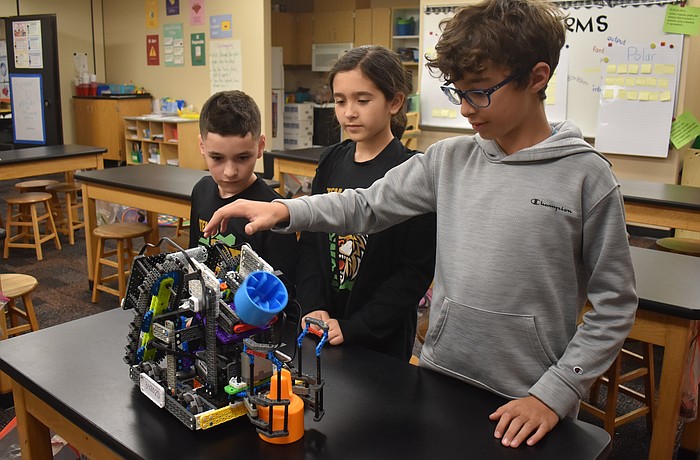 Team Thunderbolts members Kenny Van Slyck, Avery Szuma and Matteo Saviano won a Create Award, which rewards unique approaches to gameplay over the standard design, to qualify for The VEX Robotics World Championship.