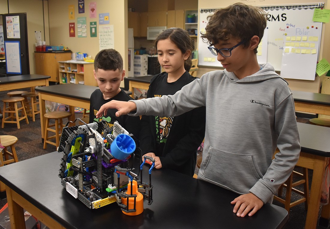 Team Thunderbolts members Kenny Van Slyck, Avery Szuma and Matteo Saviano won a Create Award, which rewards unique approaches to gameplay over the standard design, to qualify for The VEX Robotics World Championship.