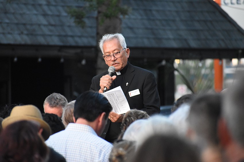 Deacon Humberto Alvia of St. Jude Catholic Church, speaks.