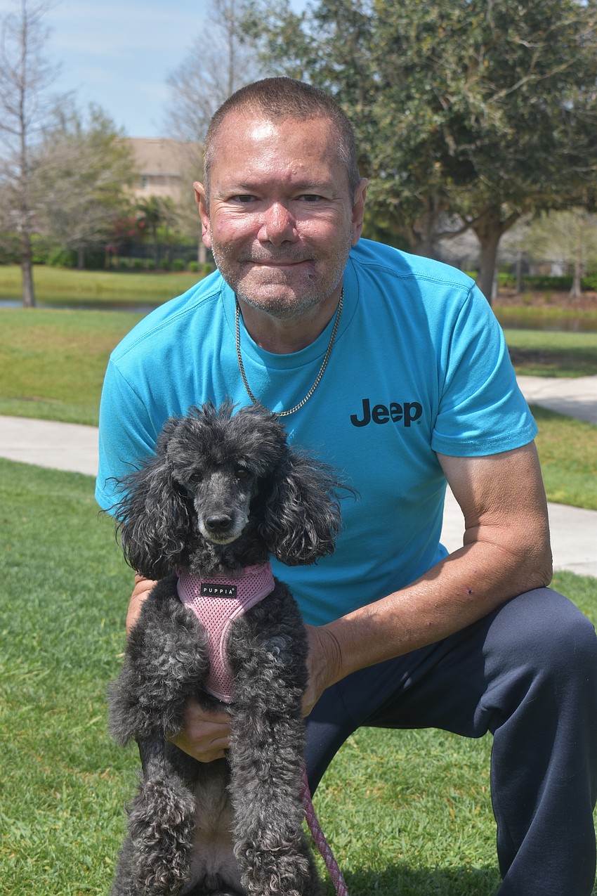 Savanna's Mark Turner says his 10-year-old miniature poodle Bailey follows him everywhere and waits by the door when he's not around.