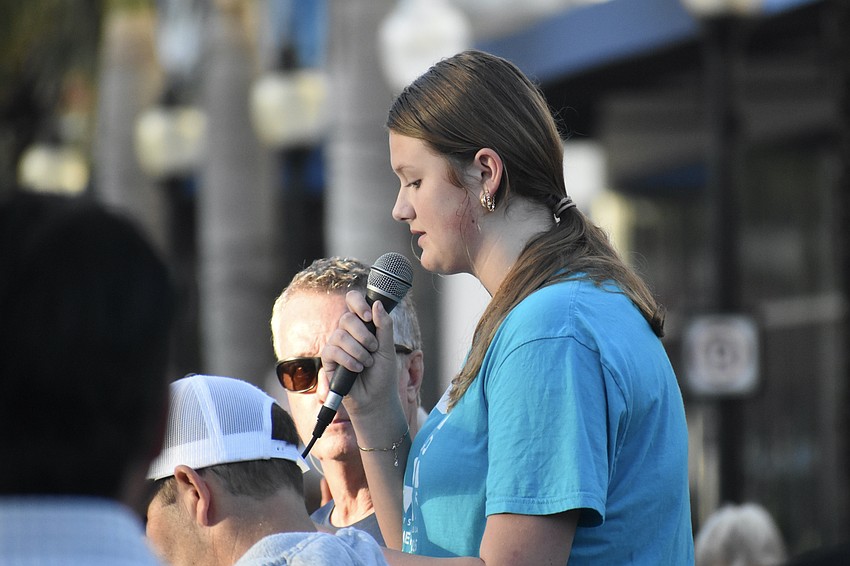 Church of the Redeemer youth group member Rorie McNash speaks.