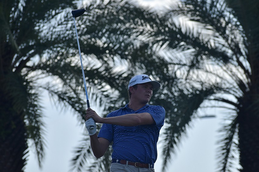 Bryce Lewis watches his drive on the 14th hole. He withdrew from the tournament ahead of the third round.