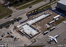Construction has advanced quickly from Feb. 8 when this aerial photo was taken. The vantage point shows how close the school is from one of the runways at the Sarasota Bradenton International Airport.