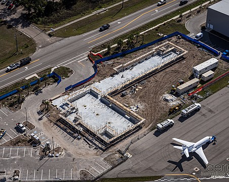 Construction has advanced quickly from Feb. 8 when this aerial photo was taken. The vantage point shows how close the school is from one of the runways at the Sarasota Bradenton International Airport.