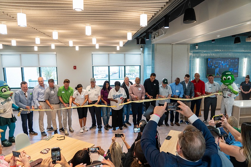 Community leaders, AdventHealth, the Daytona Tortugas and Major League Baseball representatives cut the ribbon for the new training center. Photo courtesy of AdventHealth