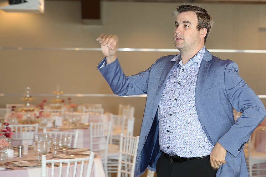 Erick Crow directs The Out-of-Door Academy Concert Choir