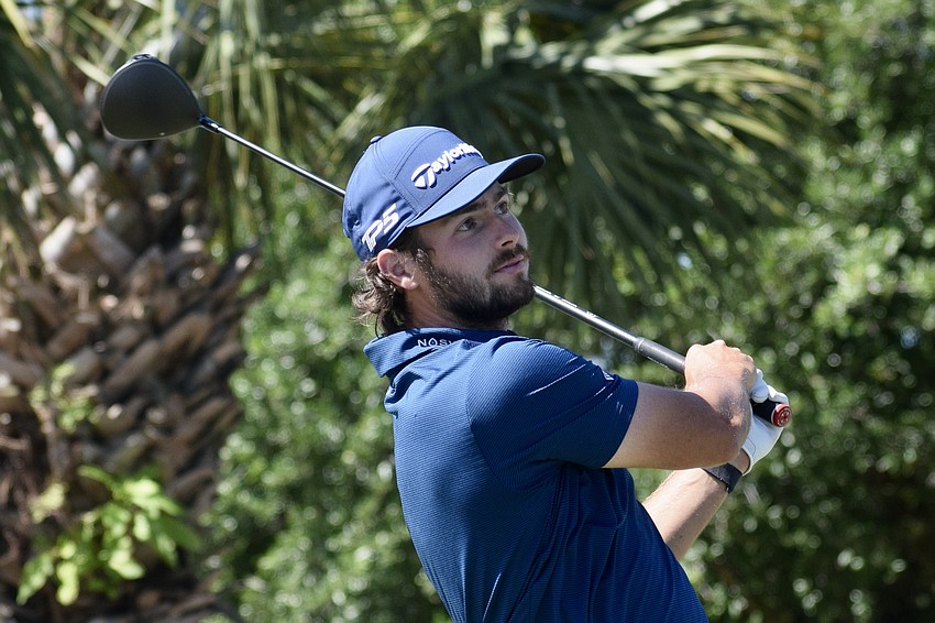 Matthew Anderson watches his drive on the 10th hole. The 25-year-old Canadian sits at eight under par for the tournament after carding four under par in the third round.