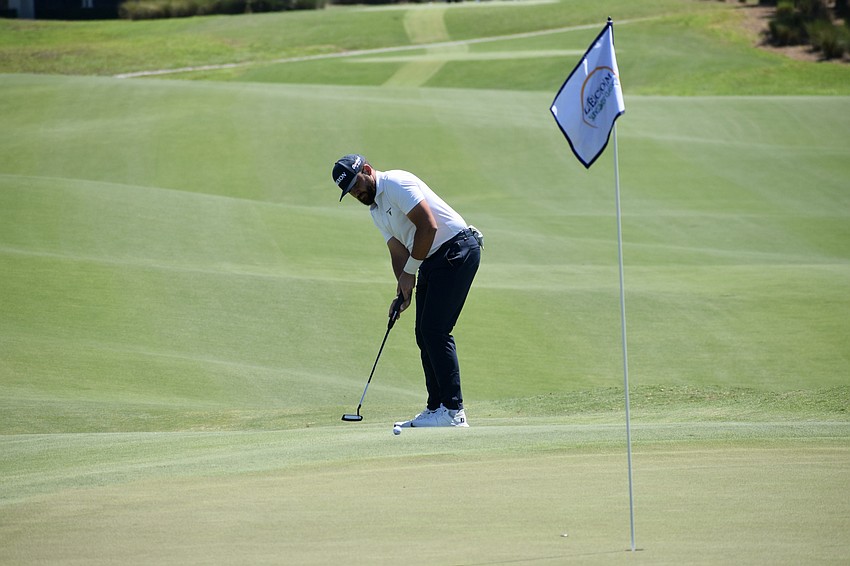 Hayden Buckley, the 2021 Suncoast Classic champion, putts towards the 11th hole. He's eight under par overall after shooting four under par in the third round.