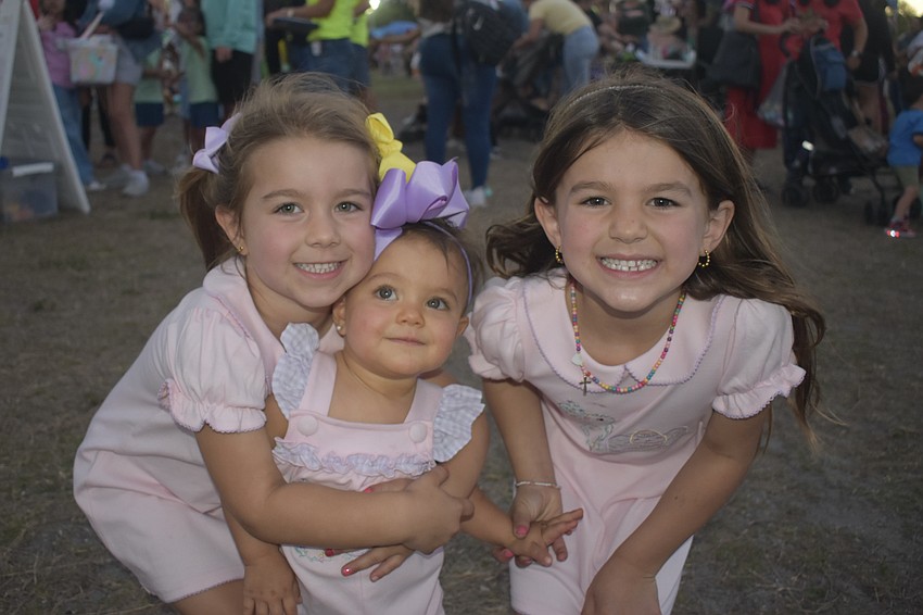Ava Glauser, 4 Emery Glauser, 1, Vallen Glauser, 6, enjoy time at the fairgrounds.