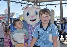 Jack Dudonis, 3, and Maxwell Dudonis, 9 meet the Easter Bunny.