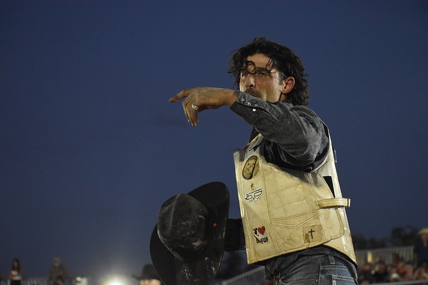 Kissimmee's Tyler Hall finishes his bull ride at the Dakin Dairy Farms' Bull Bash April 4.