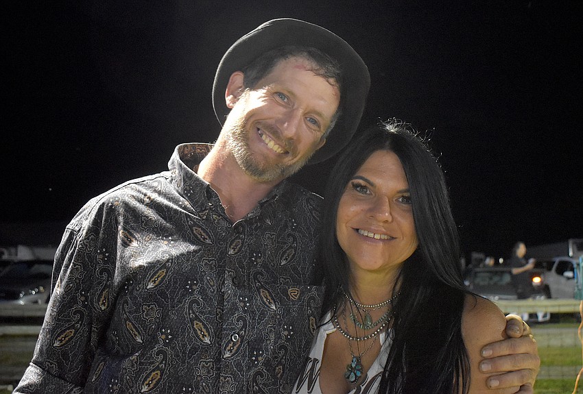 Okeechobee's Kevin Rooster McKeeman was the first bull rider to perform at the Dakin Dairy Farms' Bull Bash. His girlfriend, Jayla Townes, was there to support him.