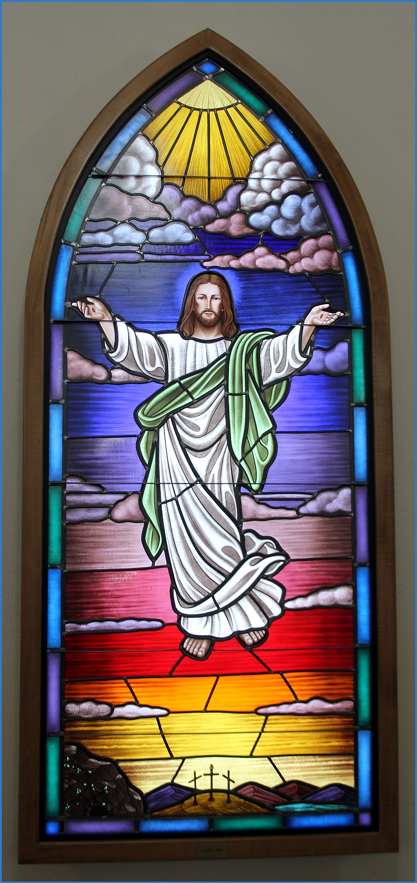 A stained glass window depicting the resurrection of Jesus Christ inside St. Mary Catholic Church in Bunnell. Photo courtesy of Randy Jaye