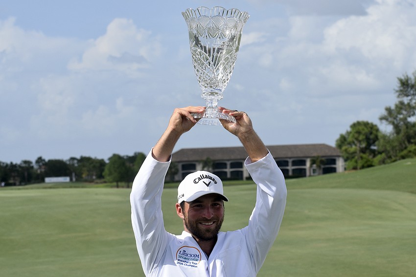 Lifting the LECOM Suncoast Classic trophy, Jeremy Gandon celebrates his second title on the Korn Ferry Tour. He secured it 364 days after his first career win.