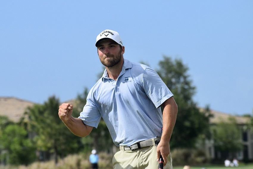 Jeremy Gandon pumps his fist after sinking the title-winning putt. The 29-year-old Frenchman rallied late and birdied his last three holes.