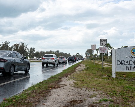 Traffic is often bumper to bumper on Gulf Drive South. During spring break, even rainy days didn’t stop tourists from flocking to Anna Maria Island.