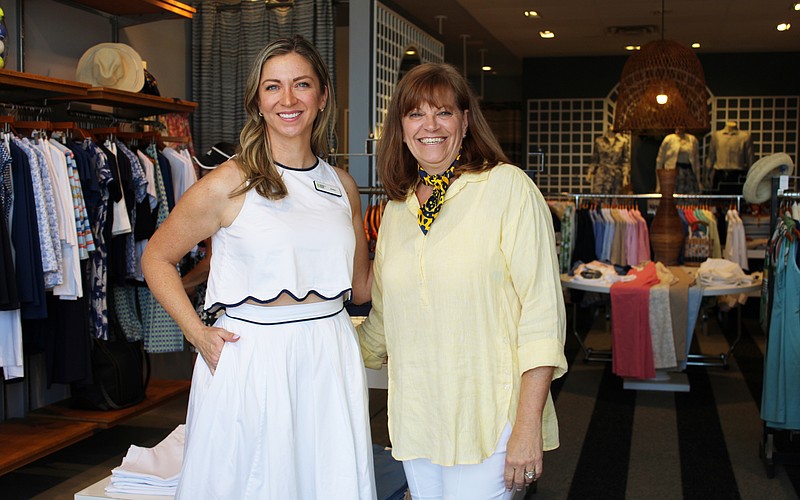 Amy Bott, executive director of Bernie's Book Bank's Florida Suncoast branch, connects with J. McLaughlin manager Melanie Dale at the boutique's recent Sip and Shop event supporting the incoming nonprofit.