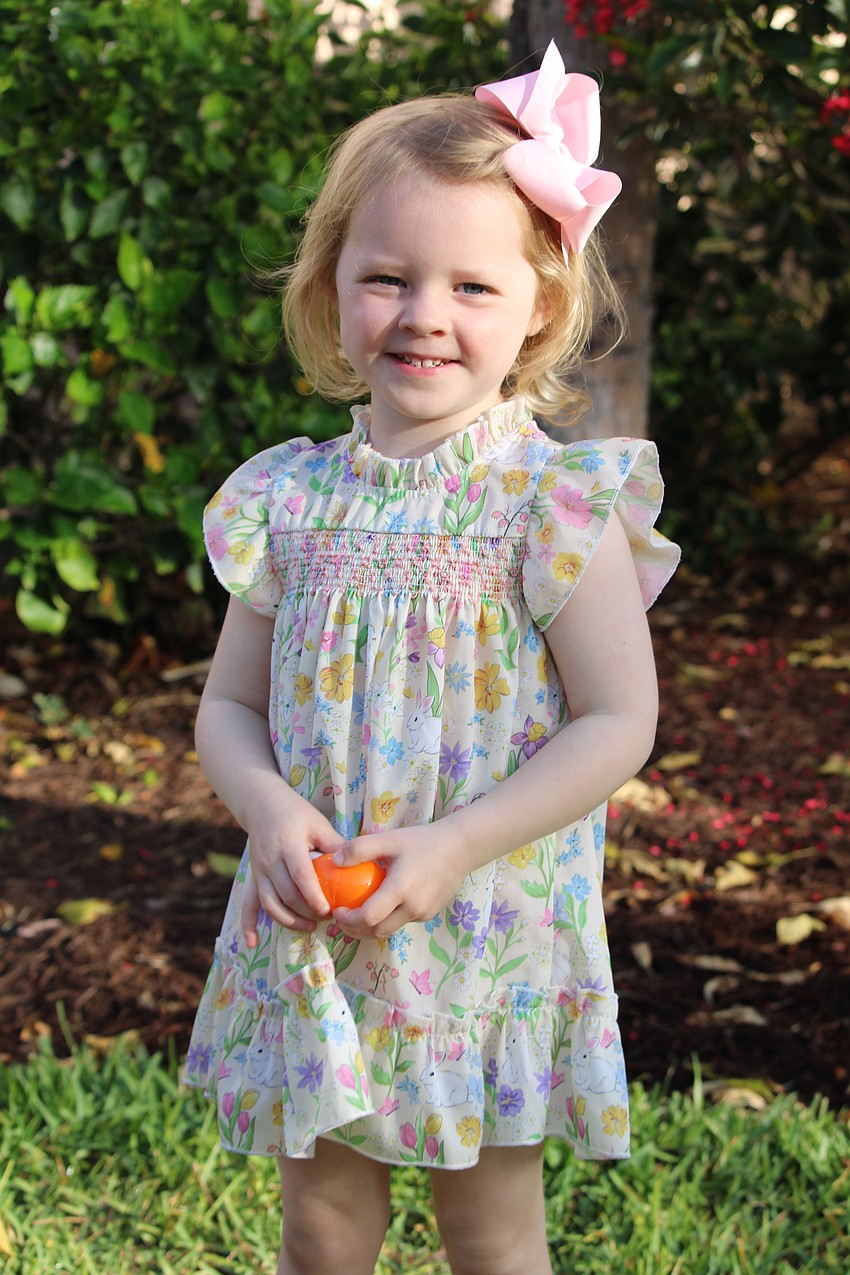 Three-year-old Collins Eblen was one of the first to find an Easter egg at the Sand Cay holiday hunt.