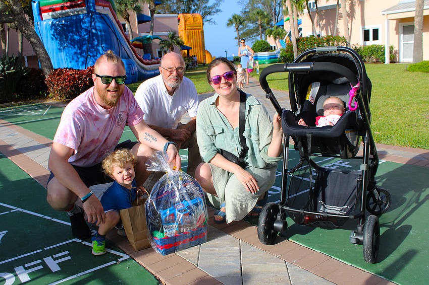 The Burke family made a full morning of Easter activities at Sand Cay on April 3. Pictured, 3-year-old Sylas, 2-month-old Quinn, Allison, Spencer and Tim Gerrety.