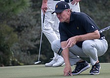 Ernie Els reads the green at The Concession during the 2023 World Champions Cup. He's No. 6 on the PGA Tour Champions money standings, as of April 6, and will be active at the Senior PGA Championship.