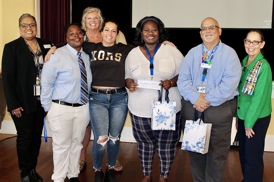 Transition specialist Brenda Loper, recipient Latria Lewis-Hartline, Dar Chapter Scholarship Chair Joy Tedder, recipient Brittany West, Director of the Falcon Hope Center Rabecka Collins, Vocational Specialist Guidino Fiore and Chapter Regent Susan Demorsky. Courtesy photo