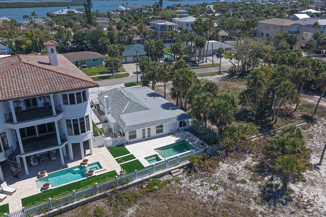 A cottage next door to Hulk Hogan's former home is up for sale on Clearwater Beach.