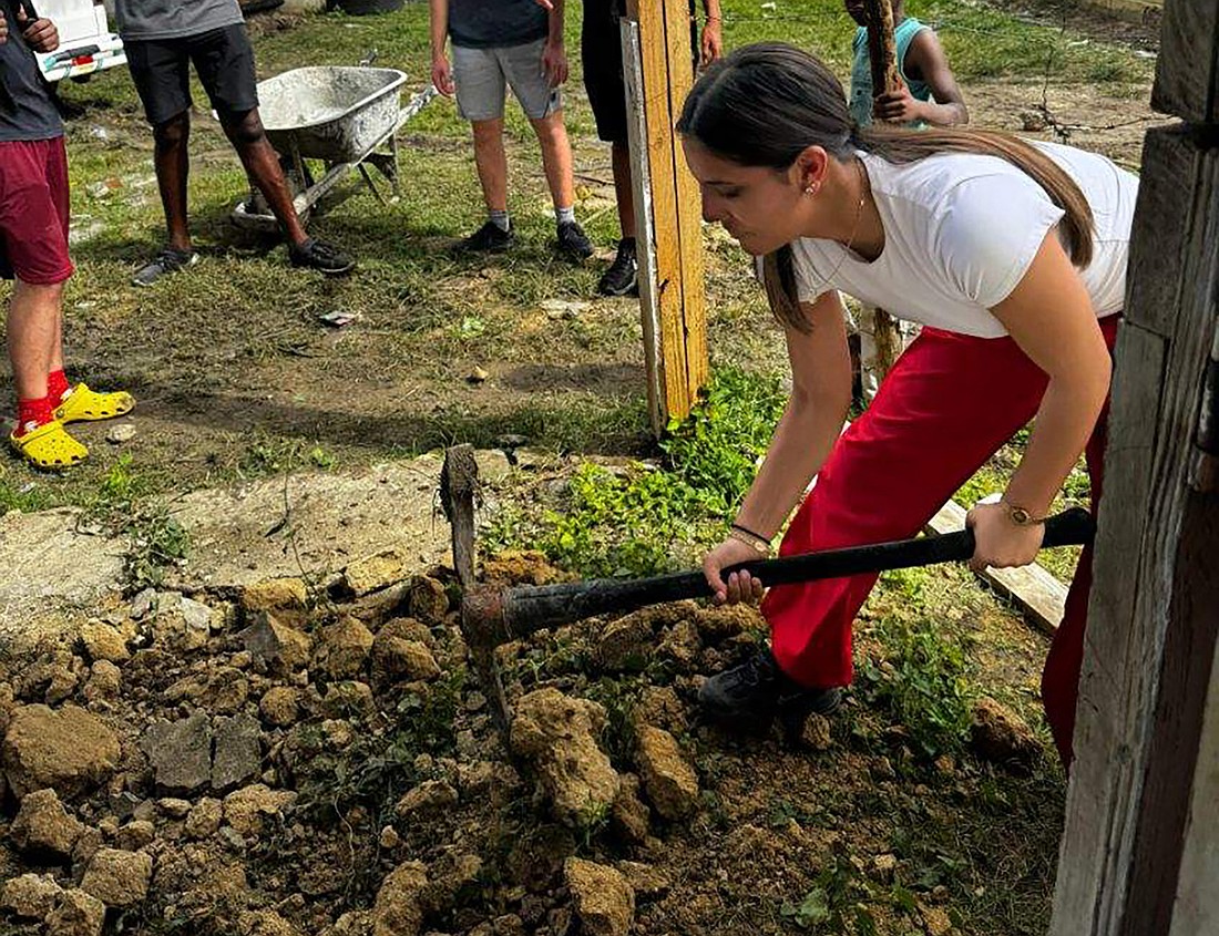 Central Florida Christian Academy students like Luna Calderon were hard at work, participating in manual labor to serve Students International. They assisted in the development of baseball and soccer academies as well as a preschool.