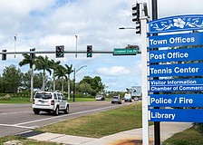 Longboat Club Road is the first signaled intersection when entering Longboat Key from the south from City Island.
