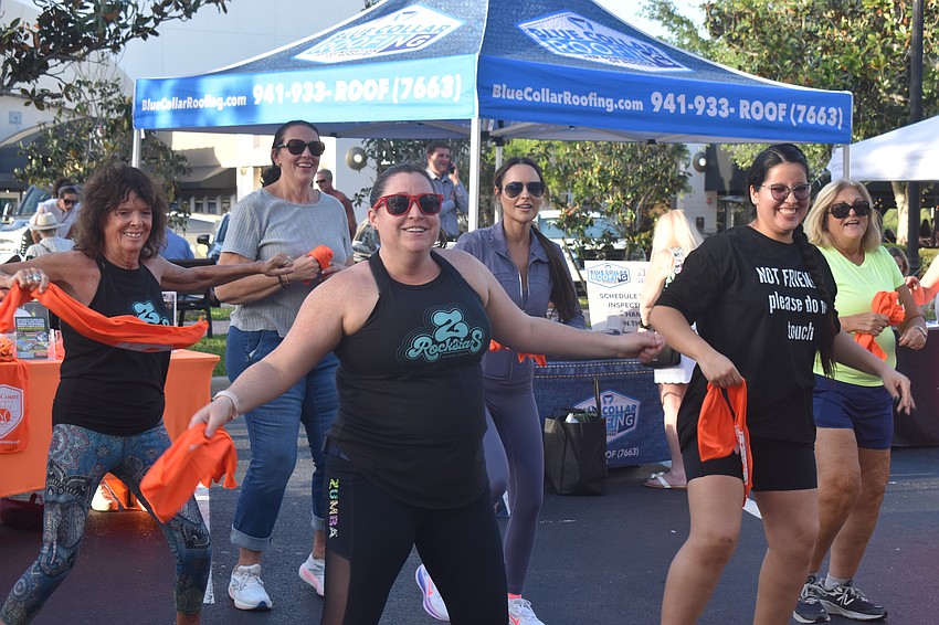 SunCourt Sports ZRockstars Cindy Wajda, Tammy McCallister Frisone, Aimee Bushway, Liz Daley, Stefanny Quevedo and Lisa Calandra dance at the Lakewood Ranch Block Party.