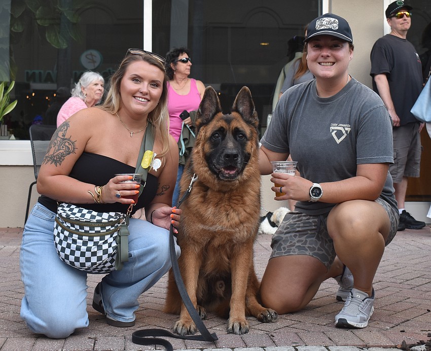 Tara and Amelia Frasure couldn't help but ask to pet Judge, a 9-year-old German shepherd, who frequents Lakewood Ranch events.