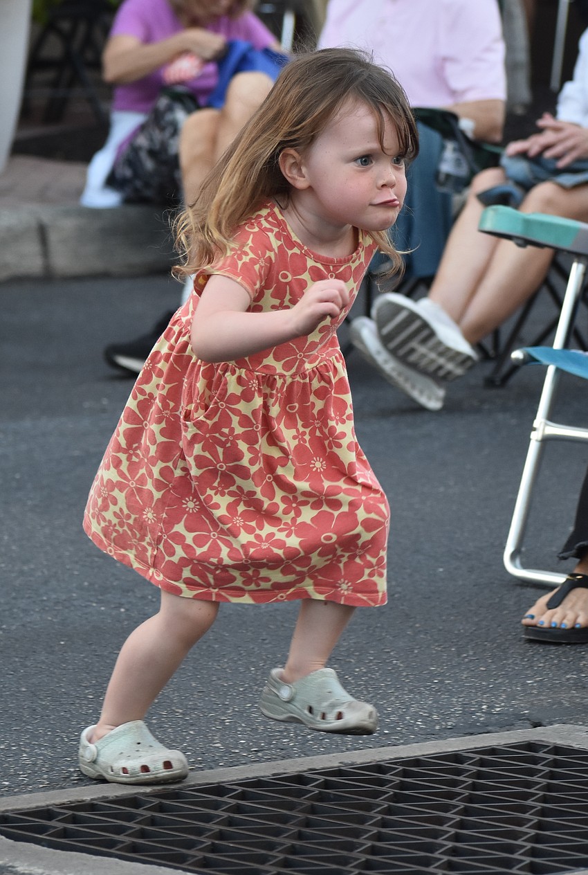Sarasota's Parker Doak, 4, makes a run for it at the Lakewood Ranch Block Party April 10.