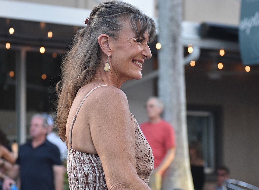 Sarasota's Michelle Plott dances to Jesse Daniels Band at the Lakewood Ranch Block Party April 10.