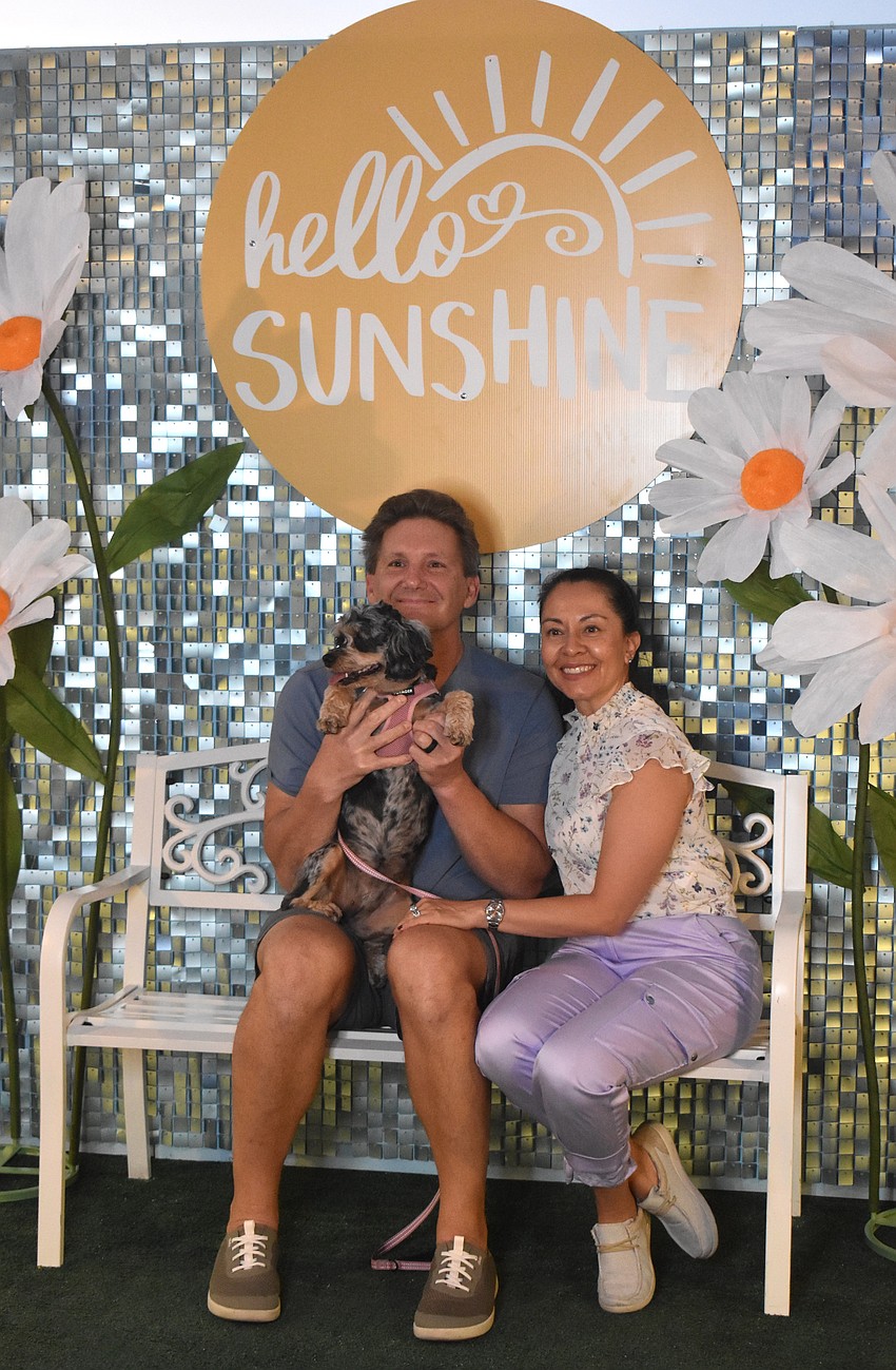 Sarasota's Al and Marcela Pogorelec celebrate the 5 year anniversary of adopting their dog Rosy at the Lakewood Ranch Block Party.