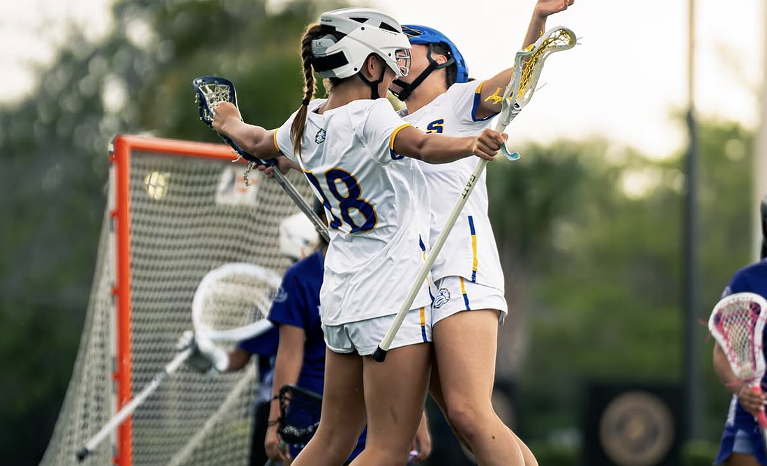 Two The First Academy girls lacrosse players reached career milestones during the team's district quarterfinal win.