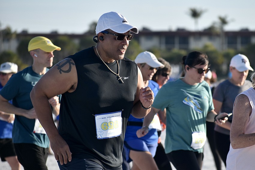 Mark Smith runs in the 5K.