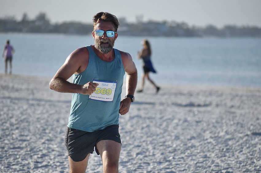 Tom Mitchell runs to the finish line.