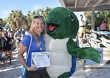 Overall female winner Vicky Romocki poses with Shelley.