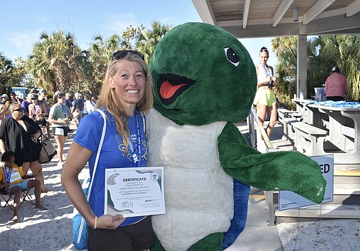 Overall female winner Vicky Romocki poses with Shelley.