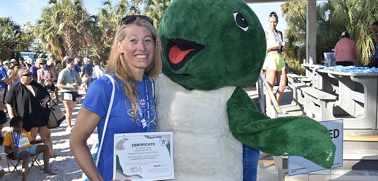 Overall female winner Vicky Romocki poses with Shelley.