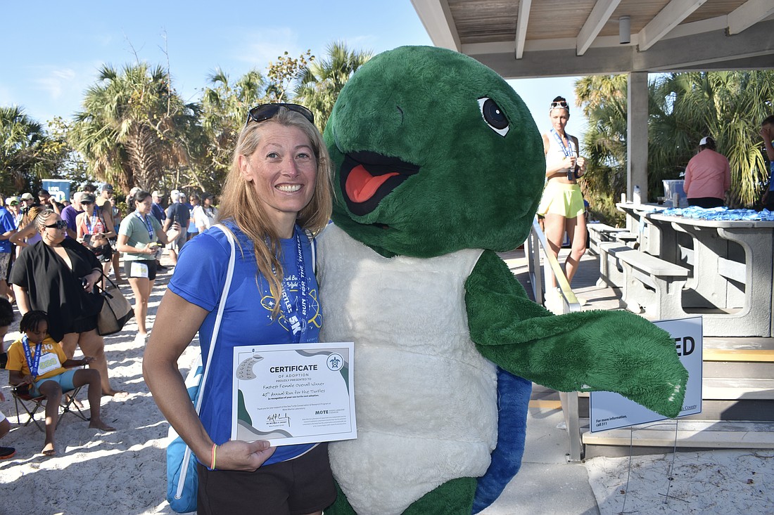 Overall female winner Vicky Romocki poses with Shelley.