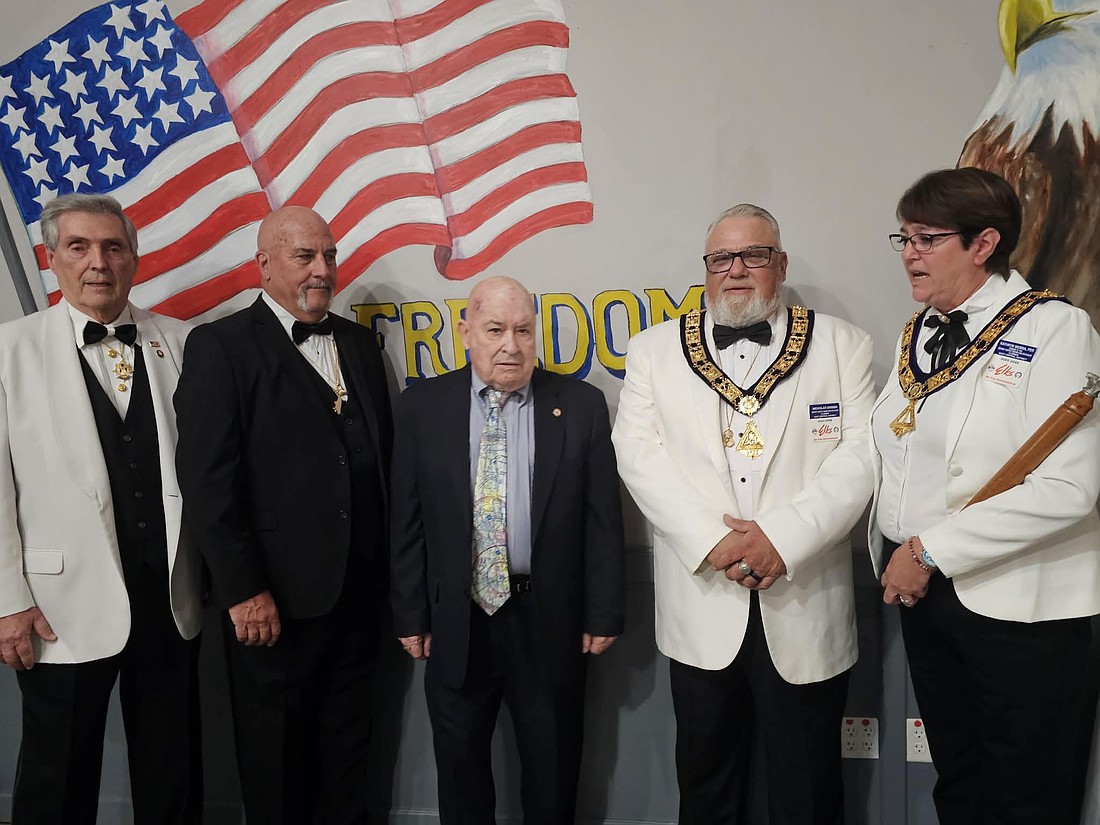 Lodge advisor Jerry Dickens Sr.; Exalted Ruler Pete Lehnertz; retired Marine Corps Col. Jack Howell; District Deputy Nick Skibba; Kathy Skibba, Merritt Island Elks Lodge No. 2650. Courtesy photo