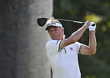 Bernhard Langer hits a drive on the third hole during the first round of the 2025 Charles Schwab Cup Championship. He's won an all-time record 12 senior majors in his storied career.