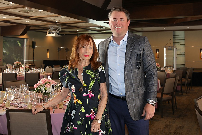 Event Chair Eileen Curd with volunteer auctioneer Bart Lowther