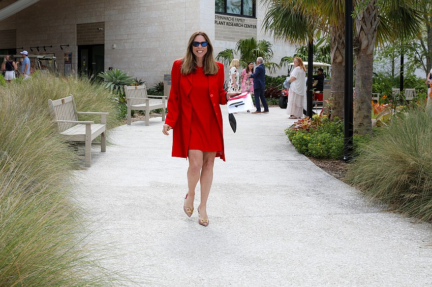 Alexis Rosenberg arrives.