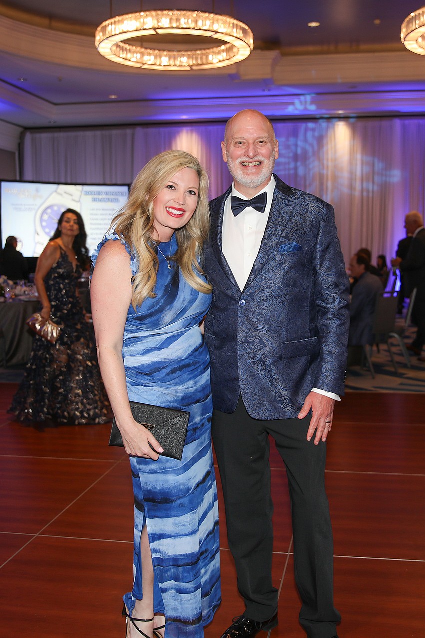 Kristin and Joel Oldham coordinated their attire to the event theme.