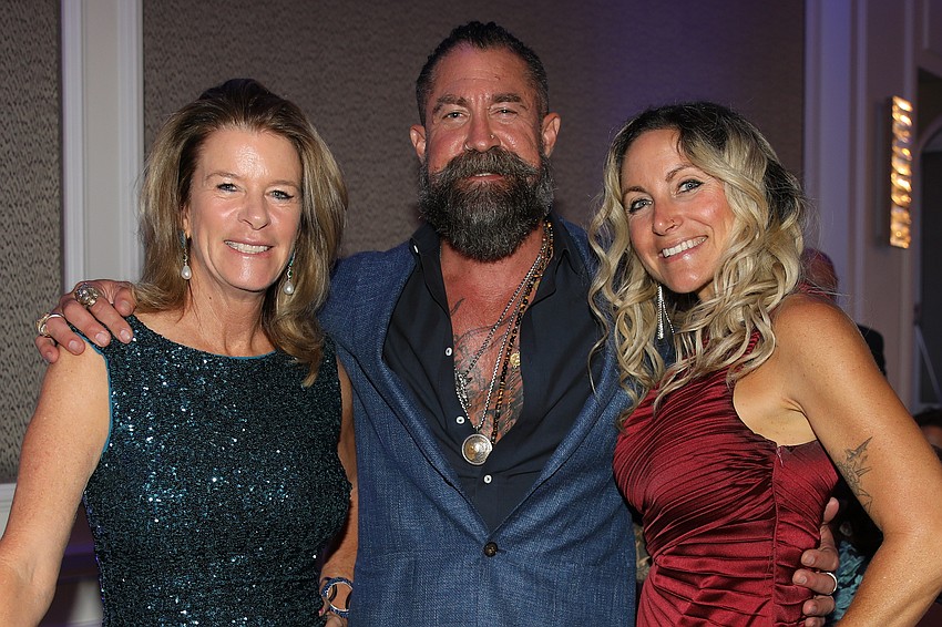 Elizabeth Moore with Dan and Nicole Starostecki