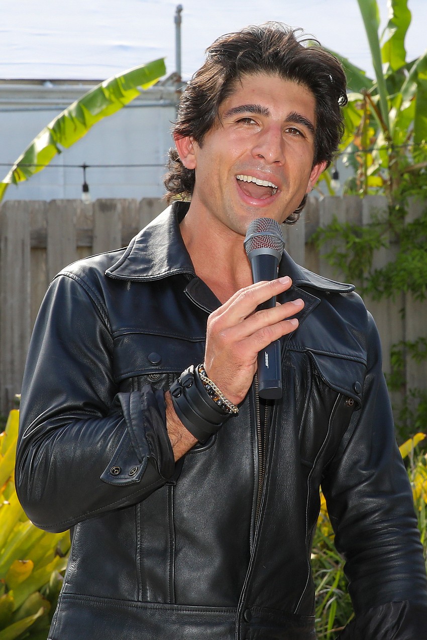 Italian American singer Troy Chiappone performs for guests in Selby Gardens.